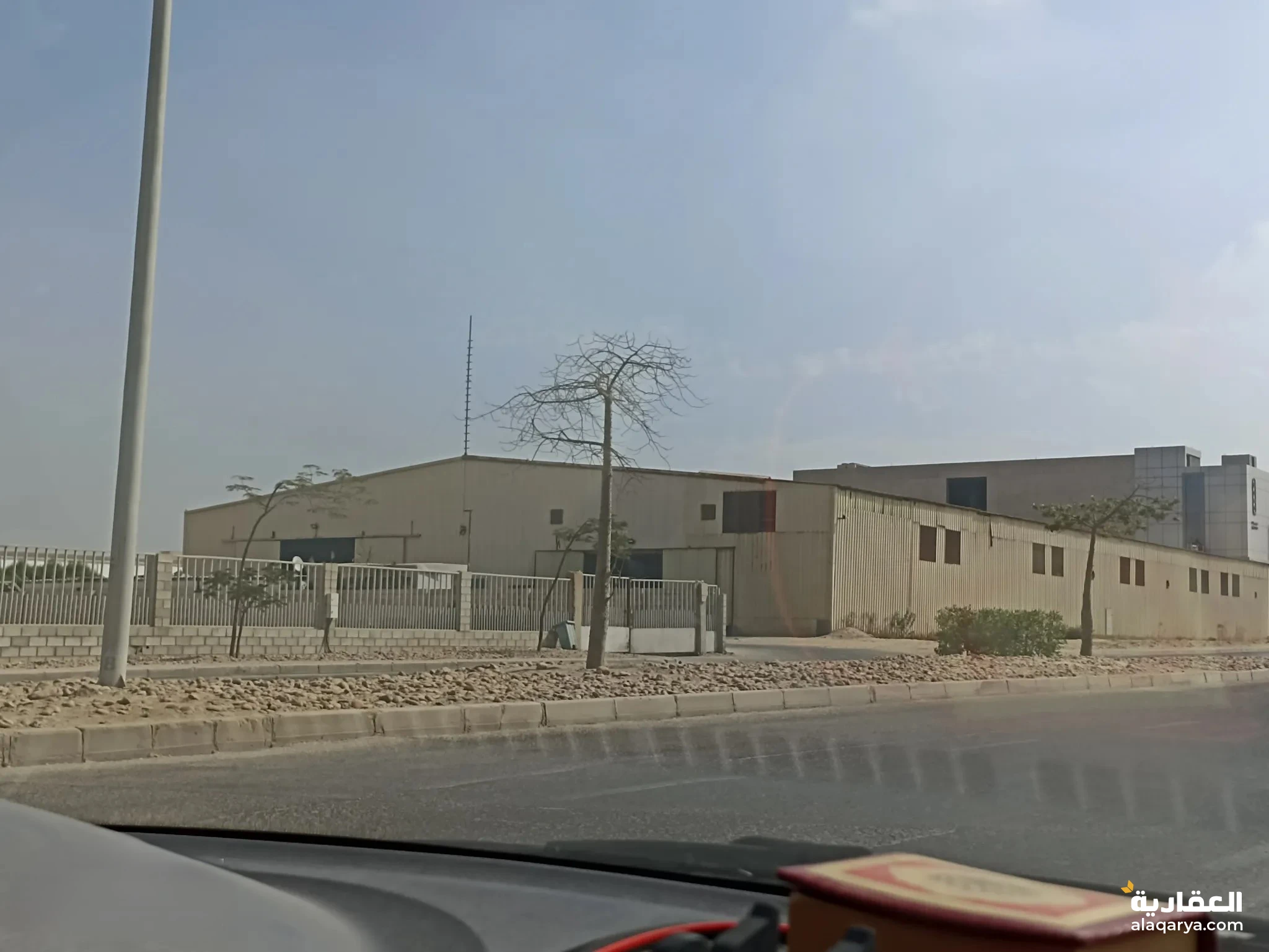 #قطعة ارض صناعي كمبوند سامي سعد اكتوبر الارض 10 الاف متر مربع مبني هنجرين